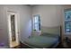 Cozy bedroom with hardwood floors, trim detail, large windows for natural light, and neutral paint at 433 Abbey Springs Way, Mcdonough, GA 30253