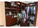 Walk in closet with lots of storage for clothing and shoes at 433 Abbey Springs Way, Mcdonough, GA 30253