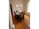 Dining room with hardwood floors, chandelier and ornate dining set at 433 Abbey Springs Way, Mcdonough, GA 30253