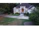Charming home featuring a well-groomed lawn and a curved driveway leading to the stately front entrance at 433 Abbey Springs Way, Mcdonough, GA 30253