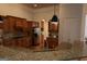 Large kitchen with granite countertops, stainless appliances, and custom cabinetry at 433 Abbey Springs Way, Mcdonough, GA 30253