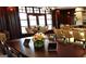 A lovely restaurant area featuring beautiful chairs, a large table, and an elegant chandelier at 433 Abbey Springs Way, Mcdonough, GA 30253