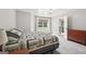 Cozy bedroom with plush carpet, soft natural light, and a neutral color palette at 140 Alford Dr, Fayetteville, GA 30215