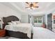 A spacious bedroom with a tray ceiling and two windows offering great light at 140 Alford Dr, Fayetteville, GA 30215