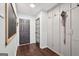 Mudroom-style hallway features storage cabinets, hardwood floors, and backyard access at 140 Alford Dr, Fayetteville, GA 30215