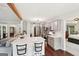 Stylish kitchen features a breakfast bar, stainless steel appliances and great lighting at 140 Alford Dr, Fayetteville, GA 30215