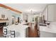 Modern kitchen with stainless steel appliances, white cabinets and breakfast bar at 140 Alford Dr, Fayetteville, GA 30215