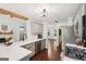 Bright kitchen features stainless appliances, grey cabinets, and white countertops at 140 Alford Dr, Fayetteville, GA 30215