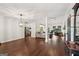 Spacious open-concept living room with wood floors, ample natural light, and neutral walls at 140 Alford Dr, Fayetteville, GA 30215