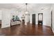 Spacious open-plan living room with hardwood flooring and bright natural light at 140 Alford Dr, Fayetteville, GA 30215