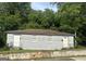 Two unit home featuring a brick facade, offering classic charm and potential at 1419 Cleveland Ave, Atlanta, GA 30344