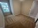 Bedroom showcasing natural light, carpet flooring, and neutral walls at 160 Odyssey Turn, Conyers, GA 30012
