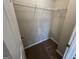 A standard sized bedroom closet with carpeting and wire rack shelving at 160 Odyssey Turn, Conyers, GA 30012