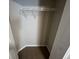 Empty closet showing wire shelving and brown carpet flooring at 160 Odyssey Turn, Conyers, GA 30012