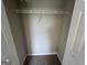 A standard sized bedroom closet with carpeting and wire rack shelving at 160 Odyssey Turn, Conyers, GA 30012