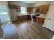 Well-lit kitchen featuring wood cabinets and stainless steel appliances at 160 Odyssey Turn, Conyers, GA 30012