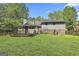 Backyard view with deck at 9138 Sunset Dr, Jonesboro, GA 30238