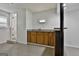 Basement bar features granite countertops, wood cabinets, and a conveniently placed sink for entertaining at 9138 Sunset Dr, Jonesboro, GA 30238