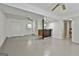 Finished basement boasting an open floor plan, bar area, and access to additional rooms at 9138 Sunset Dr, Jonesboro, GA 30238