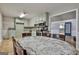 Open dining area with granite table and access to kitchen, perfect for entertaining at 9138 Sunset Dr, Jonesboro, GA 30238