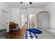Bedroom featuring a desk, closet, and view to the bathroom at 150 Dean Dr, Tyrone, GA 30290