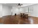 Large bonus room with hardwood floors and a ceiling fan at 150 Dean Dr, Tyrone, GA 30290