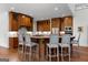 Modern kitchen with granite countertops, stainless steel appliances, and breakfast bar seating at 150 Dean Dr, Tyrone, GA 30290