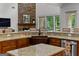 A closer look at the kitchen island and copper farmhouse sink at 150 Dean Dr, Tyrone, GA 30290