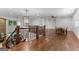 Second floor loft overlooking indoor pool with adjacent bonus room and custom railing at 150 Dean Dr, Tyrone, GA 30290