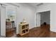 A bright office with a small bookcase and a large window allowing for plenty of natural light at 150 Dean Dr, Tyrone, GA 30290