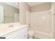 Bathroom with a white vanity, toilet, a tub and shower combo, and black and white tile flooring at 2801 Priestcliff Dr, Smyrna, GA 30080