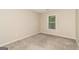 Bedroom with neutral walls, carpet, one window, and electrical outlets at 2801 Priestcliff Dr, Smyrna, GA 30080