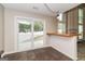 Cozy breakfast nook area featuring tile floors, a bar top, and natural light at 2801 Priestcliff Dr, Smyrna, GA 30080