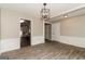Dining space with modern flooring, decorative trim, and an open view into the kitchen at 2801 Priestcliff Dr, Smyrna, GA 30080