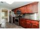 Updated kitchen featuring stainless steel appliances, dark cabinets, and ample counter space at 2801 Priestcliff Dr, Smyrna, GA 30080