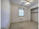 Bedroom with carpeted floors, a window with valance, and a closet for storage at 668 Spring Place Ne Rd, White, GA 30184
