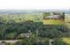 A landscape of mature trees surrounding the property from an aerial point of view at 2179 Mountclaire Ct, Stone Mountain, GA 30087