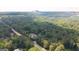 A beautiful home nestled among lush trees, offering privacy and a serene environment with sprawling greenery at 2179 Mountclaire Ct, Stone Mountain, GA 30087