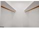 A closet with shelves and a hanging rod for optimal storage at 2179 Mountclaire Ct, Stone Mountain, GA 30087
