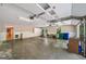 Spacious garage with storage cabinets, room for multiple cars, and access to the home's interior at 2179 Mountclaire Ct, Stone Mountain, GA 30087