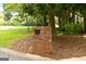 Charming brick mailbox with a decorative dog statue adds character and curb appeal to the property at 2179 Mountclaire Ct, Stone Mountain, GA 30087