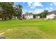 Expansive backyard featuring a deck and an in-ground pool, perfect for outdoor activities and relaxation at 345 Wynbrook Dr, Mcdonough, GA 30253