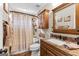 Cozy bathroom with tile floors, vanity, a bathtub and shower with curtain at 345 Wynbrook Dr, Mcdonough, GA 30253