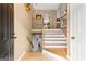 Inviting foyer with wood flooring and staircase leading to the upper level at 345 Wynbrook Dr, Mcdonough, GA 30253