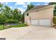 Spacious two-car garage with ample parking and access to a private pool area at 345 Wynbrook Dr, Mcdonough, GA 30253