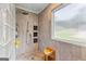 Bathroom tiled shower features a tiled seat, window, and sleek shower fixtures at 345 Wynbrook Dr, Mcdonough, GA 30253