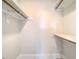 Walk-in closet with built-in shelves provides ample storage space and organization at 503 Countryside Se Pl, Smyrna, GA 30080