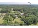 Aerial view of a home with a clearly outlined boundary and mature trees at 306 Tyrone Rd, Fayetteville, GA 30214