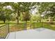 Private backyard view from an elevated deck with iron railing at 306 Tyrone Rd, Fayetteville, GA 30214