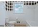 Bathroom featuring updated vanity, and shower-tub with checkered accent wall at 306 Tyrone Rd, Fayetteville, GA 30214